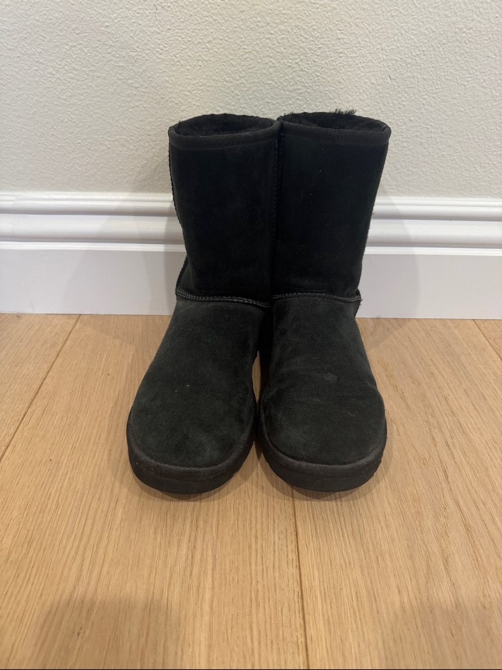 UGG! NEVER WORN! Women’s size 10. Black SUEDE SHEEPSKIN slip on tall boots!